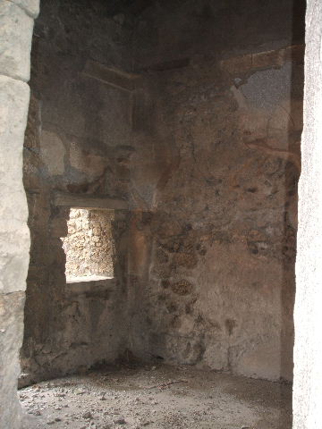 IX.2.17 Pompeii. May 2005. Looking west along fauces to atrium.