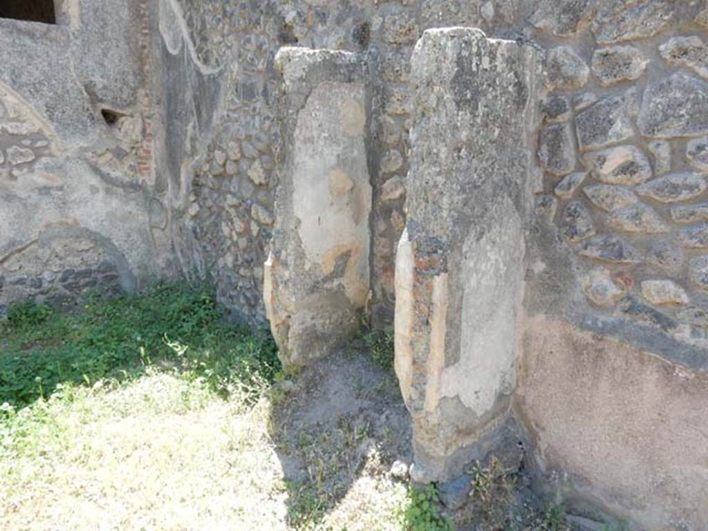 IX.2.27 Pompeii. May 2017. Remains of shrine on wall of peristyle, looking south along west wall. Photo courtesy of Buzz Ferebee.

