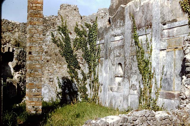 IX.3.2 Pompeii.  May 2006. Stucco decoration in the first style on the south wall of garden.