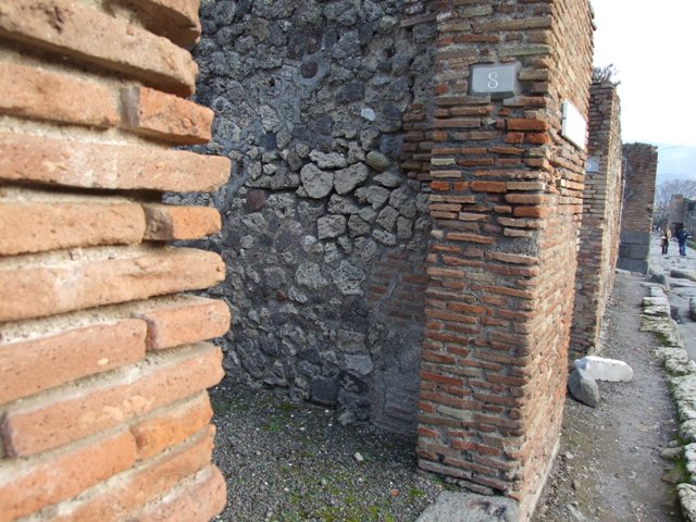 IX.3.8. Pompeii.December 2007. Looking west to front of shop, steps against north wall.
