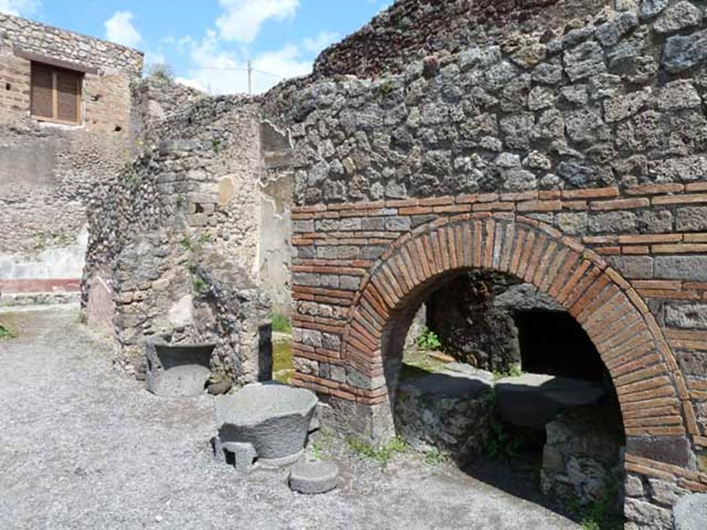 IX.3.12 Pompeii. May 2010. Looking north from oven towards triclinium, with doorway on left of photo.