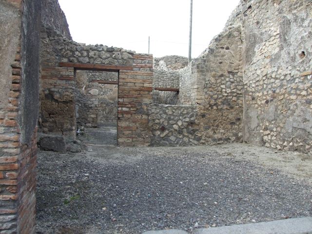 IX.3.13 Pompeii. March 2009. Triclinium. West wall, with remains of plaster.