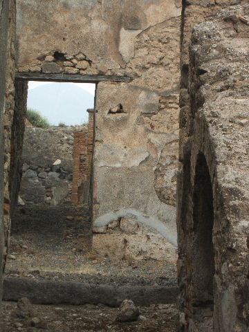 IX.3.15 Pompeii. March 2009. Room 2. Remains of impluvium, and puteal.