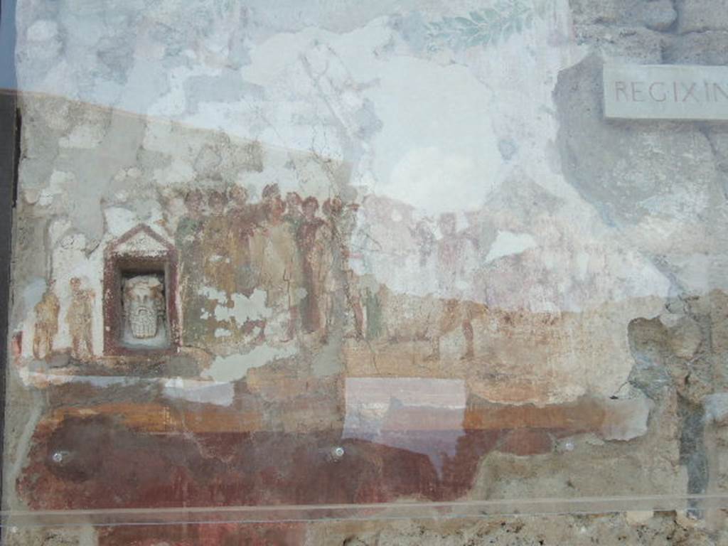 IX.7.1 Pompeii. September 2021.  
Paintings of four gods, (Apollo, Jupiter, Mercury und Diana), above entrance doorway. Photo courtesy of Klaus Heese.

