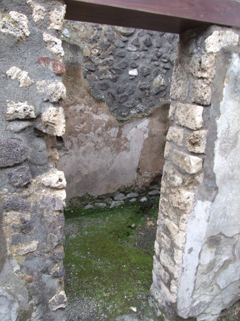 IX.8.6 Pompeii. December 2007. Room 39, north wall of outer room. Remains of wall painting of Cassandra. See Engelmann, W., 1929. New Guide to Pompeii: Second Edition. Engelmann. (p.37). See Sogliano, A., 1879. Le pitture murali campane scoverte negli anni 1867-79. Napoli: Giannini. (p. 129, No. 628).