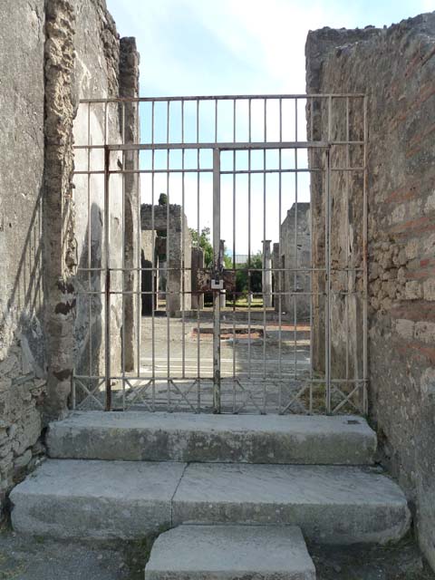 IX.8.6 Pompeii. March 2009.  Looking south along east side of atrium.