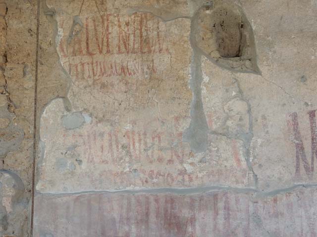 IX.12.7  Pompeii, May 2018. Graffiti between IX.12.6 and IX.12.7. Photo courtesy of Buzz Ferebee.