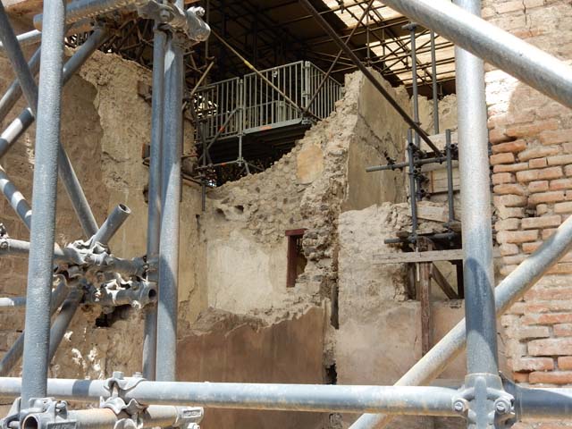 IX.12.7 Pompeii, May 2018. Looking towards west wall of shop, at the rear is room 9 of IX.12.6.
Photo courtesy of Buzz Ferebee.
