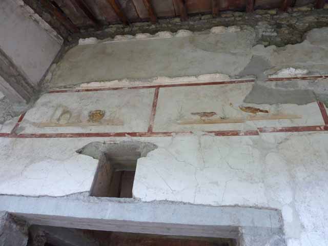 IX.13.1-3 Pompeii. March 2009. Room 13, plaster cast of door in south-east corner.