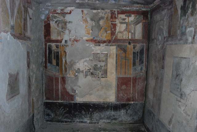 IX.13.1-3 Pompeii. May 2010. Room 9, painting of heads on upper east wall.