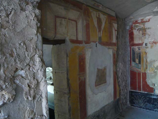 IX.13.1-3 Pompeii. March 2009. Room 9, looking south, from peristyle to rear of corridor (room 7) and window of room 14.