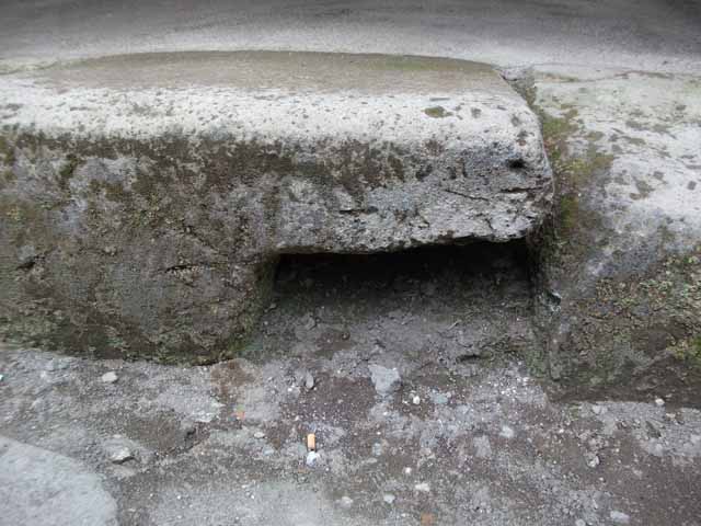 IX.13.1-3 Pompeii. September 2004. Room 1. Looking west towards entrances IX.13.3 (with graffito) and IX.13.2 (entrance).



