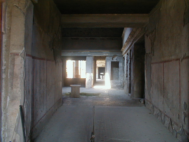 IX.13.1-3 Pompeii. September 2004. Room 2, east side of atrium.