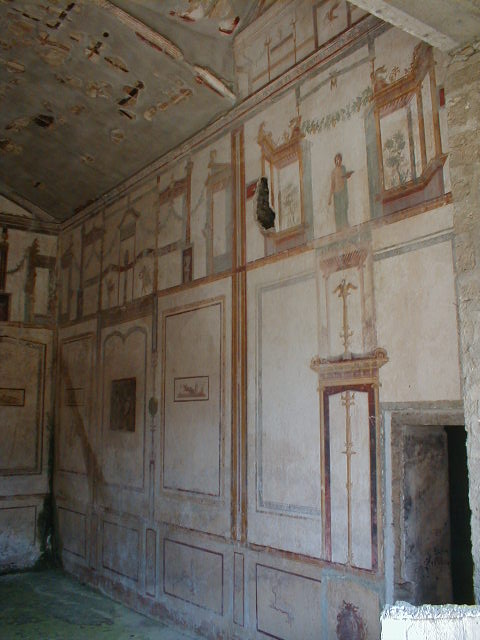 IX.13.1-3 Pompeii. March 2009. Room 11, north wall. Remains of wall painting, possibly Narcissus?