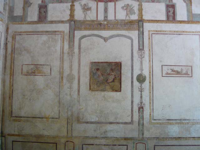 IX.13.1-3 Pompeii. March 2009. Room 11, upper north wall. Architectural painting with bird (cockerel?) and plate with food.