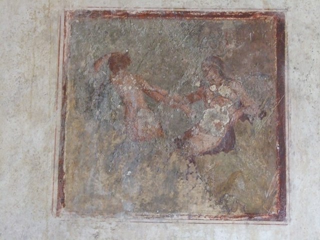 IX.13.1-3 Pompeii. March 2009. Room 11, east wall. Painted figure.