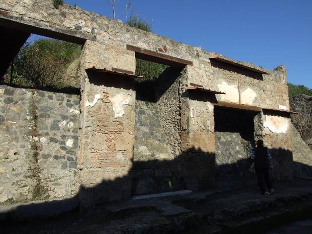 IX.13.5 Pompeii. December 2005. House – centre doorway – not excavated. According to Della Corte, found on the west (left) of the entrance doorway was a graffito – Fabius Ululitremulus cum Sula rog(at)     [CIL IV 7963]
Also found were names of other dependants of Fabio –
(Fullones) Calamus, Leno, Pegte (?)   [CIL IV 9125-9132]
Ephebus, Ricinus, Gerulus (or Glerus)  [CIL IV 9116]
See Della Corte, M., 1965.  Case ed Abitanti di Pompei. Napoli: Fausto Fiorentino. (p.337)
According to Epigraphik-Datenbank Clauss/Slaby (See www.manfredclauss.de), these read as –
C(aium)  Cuspium  Pansam  et 
L(ucium)  Popidium  L(uci)  f(ilium)  Secundum  aed(iles)  o(ro)  v(os)  f(aciatis) 
Fabius  Ululitremulus  cum  Sul(l)a  rog(at)       [CIL IV 7963]
Fullones       [CIL IV 9125a]
Fullones       [CIL IV 9125b]
Fullo[nes]    [CIL IV 9125c]
Roma       [CIL IV 9126a]
Roma       [CIL IV 9126b]
Scripsit  Calamus  cum  atramentario  Leno  E[p]hebus  hac       [CIL IV 9127]
Fullones 
Ricino  Pegte  rog(at)           [CIL IV 9128a]
Fullones  Pegte  rog(at)       [CIL IV 9128b]
Fullones  Eno  Cn(aei)  f(ilio)  Rul[l]i  roga(mus)       [CIL IV 9129]
Mortu(u)s 
Cirulus 
Nonas 
poste[r]u    [CIL IV 9132]
Mortu(u)s 
Gloerus 
posteru Nonas      [CIL IV 9116]

