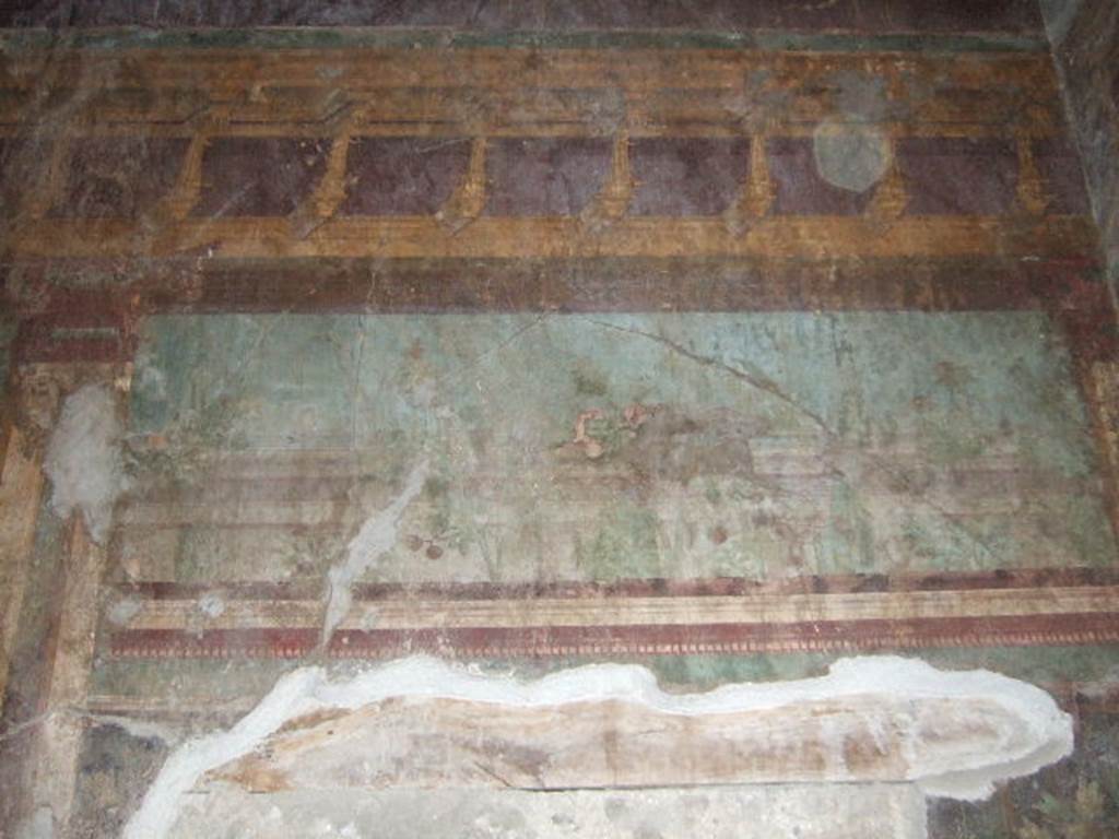 Villa of Mysteries, Pompeii. May 2006. Room 6, east wall, painted detail from above blocked doorway.