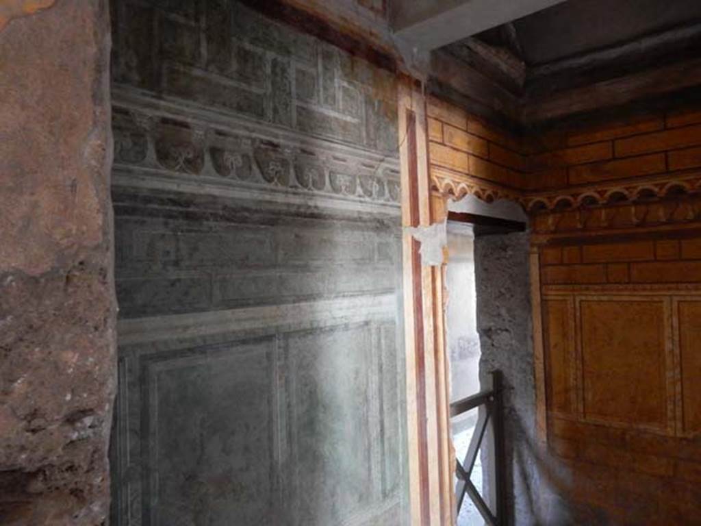 Villa of Mysteries, Pompeii. May 2015. Room 3, east wall from room 64. Looking towards doorway into corridor F1. Photo courtesy of Buzz Ferebee.
