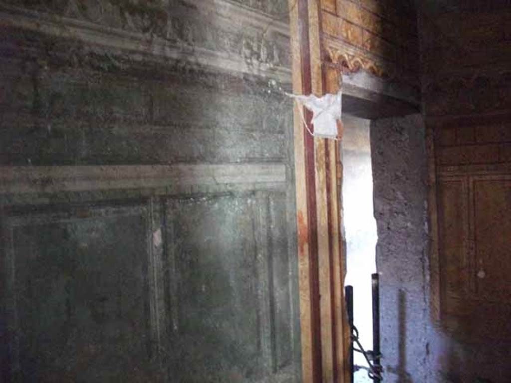Villa of Mysteries, Pompeii. May 2010. Room 3, east wall from room 64. Looking towards doorway into corridor F1.