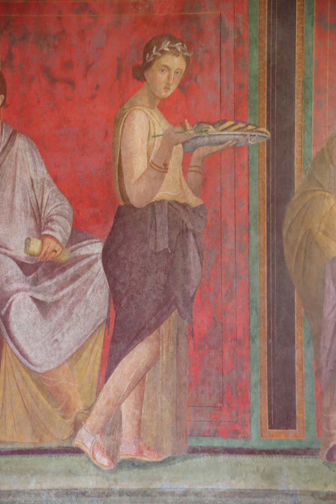 Villa of Mysteries, Pompeii. September 2021. 
Room 5, a pregnant young woman offers sacred cakes, detail of figure from north wall. 
Photo courtesy of Klaus Heese.

