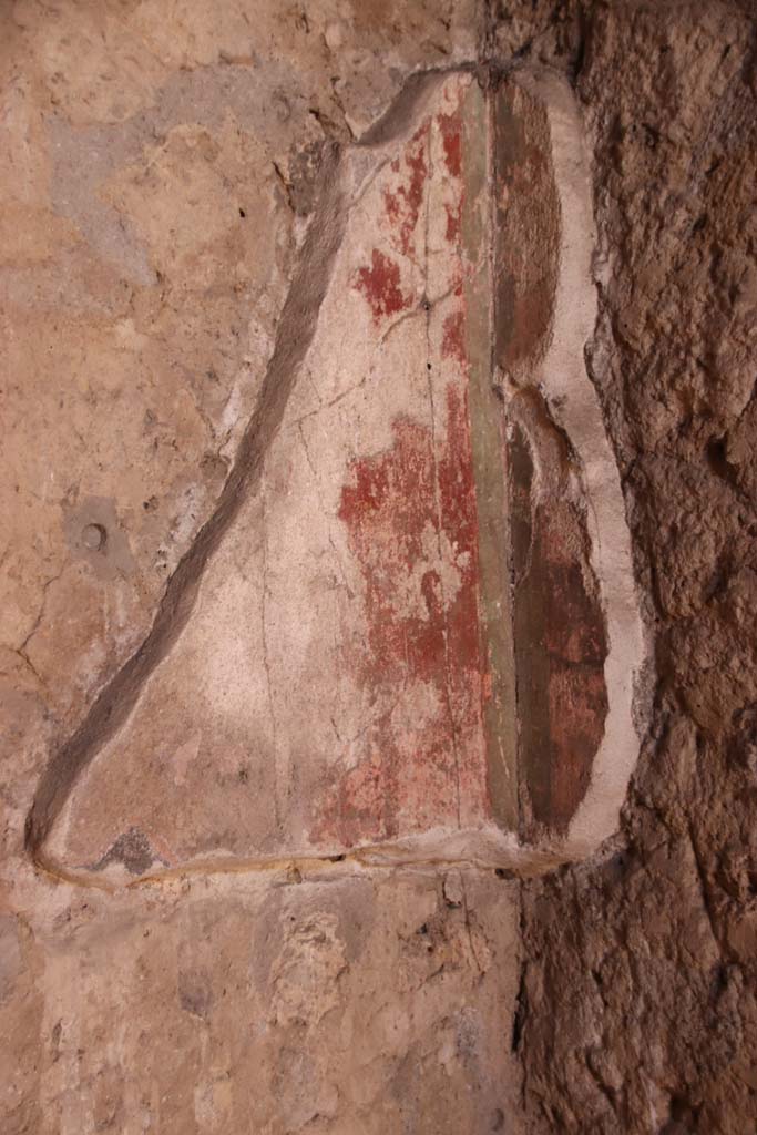 Villa Regina, Boscoreale. September 2021. 
Room IV, detail of remaining painted decoration from lower north wall in north-east corner of triclinium. 
Photo courtesy of Klaus Heese.
