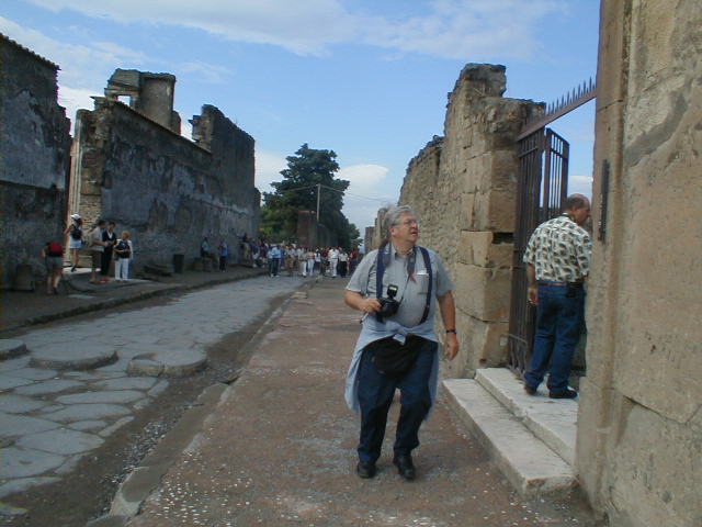 Looking west straight across the Forum towards the east end of the Via Marina, from Via dell’Abbondanza. May 2010.