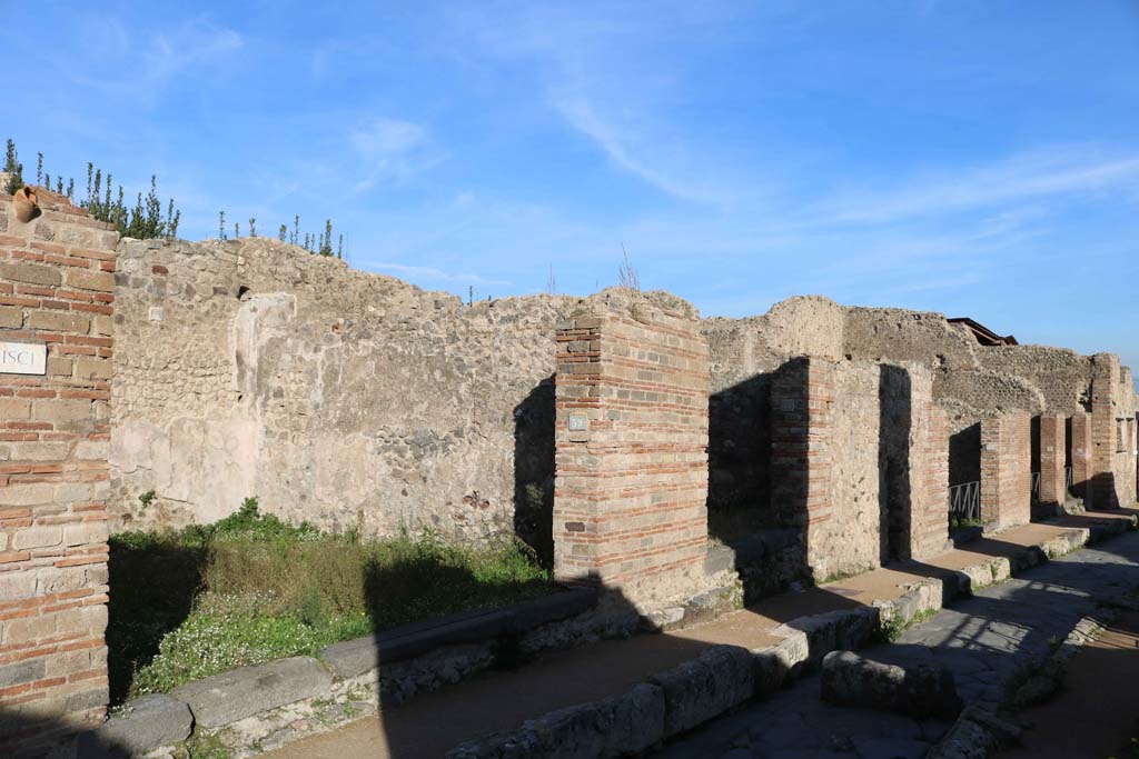 Via degli Augustali, north side, Pompeii. December 2018. Looking east from near VII.2.39. Photo courtesy of Aude Durand.