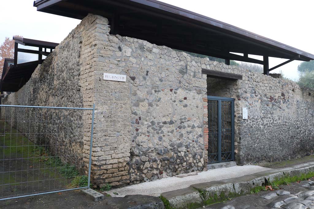 Via di Nocera, Pompeii. December 2018. 
Looking east towards doorway on corner of insula II.8, with Via della Palestra, on left. Photo courtesy of Aude Durand.


