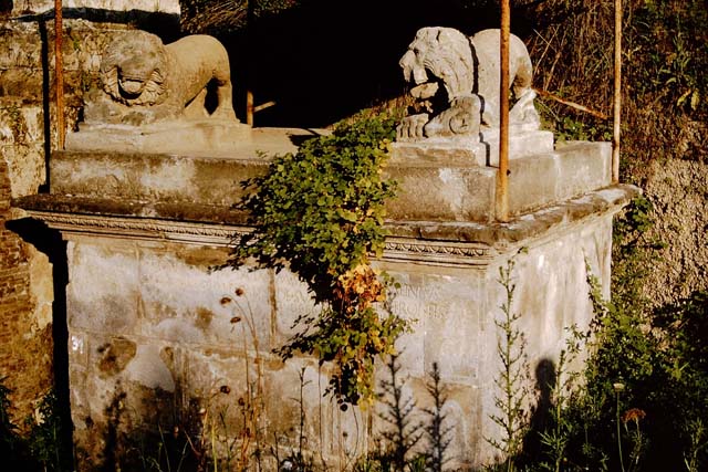 Pompeii Porta Nocera Tomb 31OS. May 2010. Lion statue on west side.