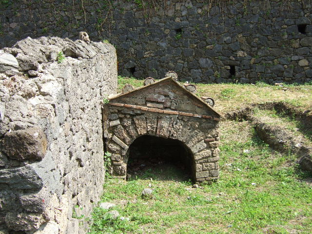Pompeii Porta Nocera Tomb 27OS. Tomb of Aulus Campius Antiocus. May 2006. A plaque on the tomb had the inscription
A(ulus) CAMPIVS
T(iti) L(ibertus) ANTIOCVS.