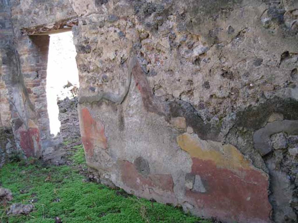 I.2.10 Pompeii. September 2010.
South wall of triclinium, with doorway into corridor in south-east corner, on left. Photo courtesy of Drew Baker.
This wall used to show a painting of Bacchus, with cantharus and panther.
According to Sogliano this had nearly disappeared when excavated.
See BDI ,1874, p.198.
See Sogliano, A., 1879. Le pitture murali campane scoverte negli anni 1867-79. Napoli: (p.38, no.160, described as young Dionysus).
According to Kuivalainen this was damaged when discovered and had disappeared by 1875.
It was described as Bacchus pouring wine from a cantharus to a panther”.
See Kuivalainen, I., 2021. The Portrayal of Pompeian Bacchus. Commentationes Humanarum Litterarum 140. Helsinki: Finnish Society of Sciences and Letters, (p.107, C2).
