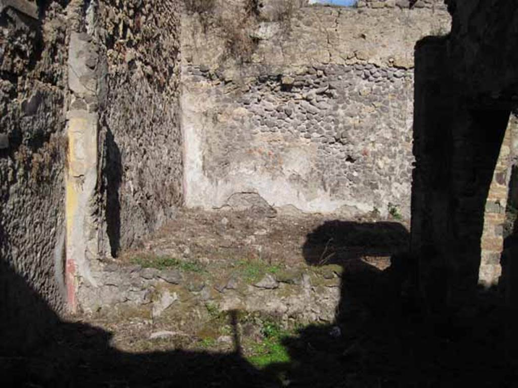 I.2.10 Pompeii. September 2010. Looking east in triclinium, through window onto garden area with remains of summer biclinium. Photo courtesy of Drew Baker.