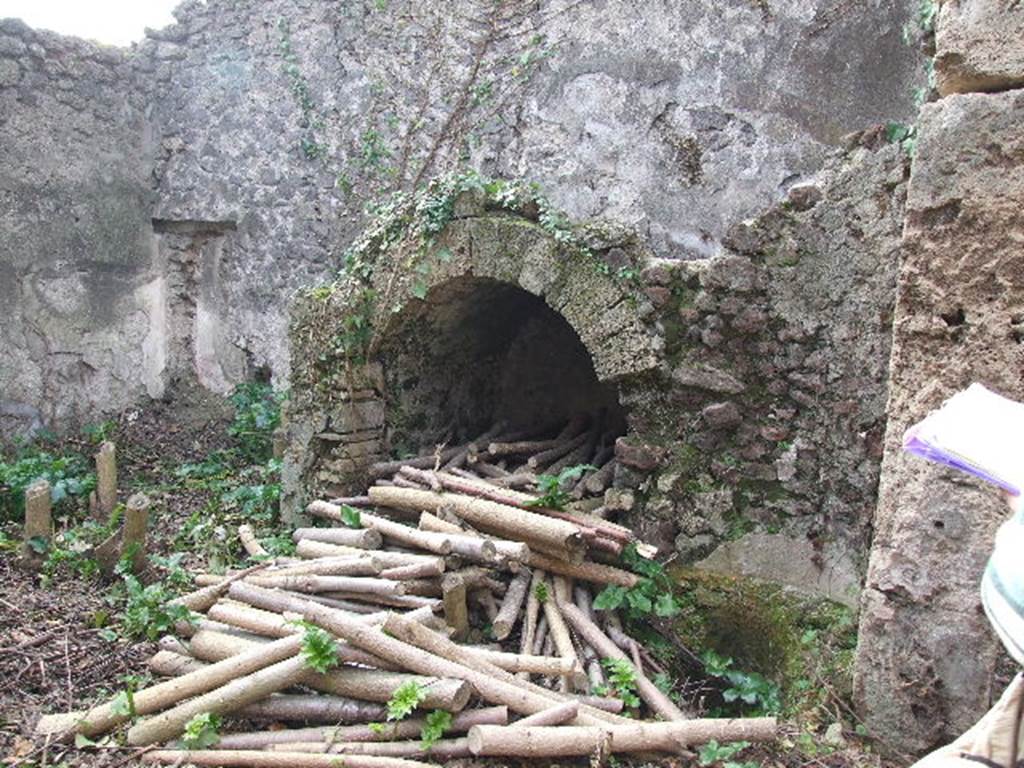 I.2.10 Pompeii. December 2006. South west corner of garden, showing cupboard under steps to upper floor.
