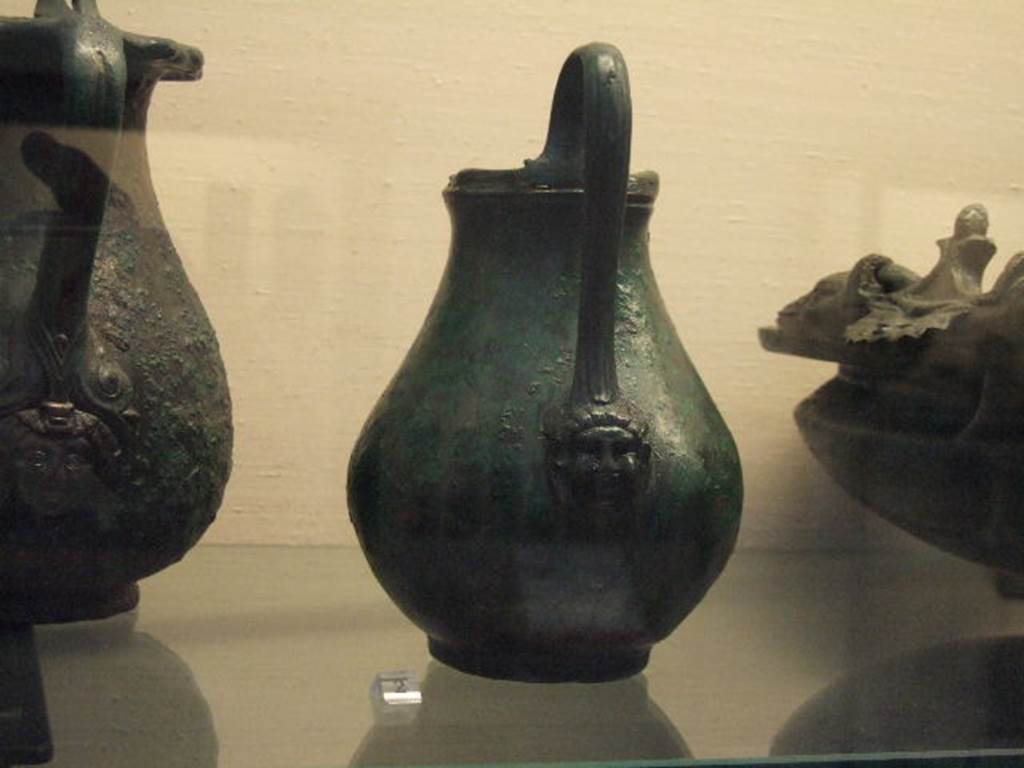 I.2.10 Pompeii. Found in Tablinum. Bronze jug. Now in Naples Archaeological Museum. Inventory number: 110053.