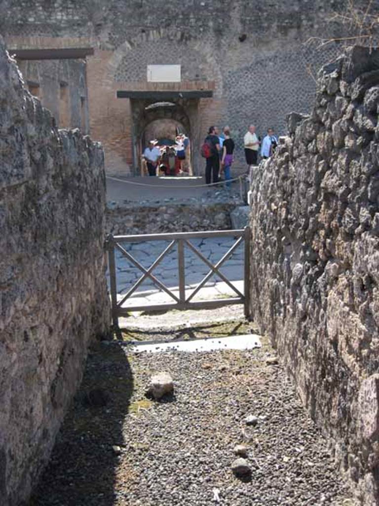 I.2.10 Pompeii. September 2010. Looking west along entrance corridor towards doorway, and Via Stabiana. Photo courtesy of Drew Baker.