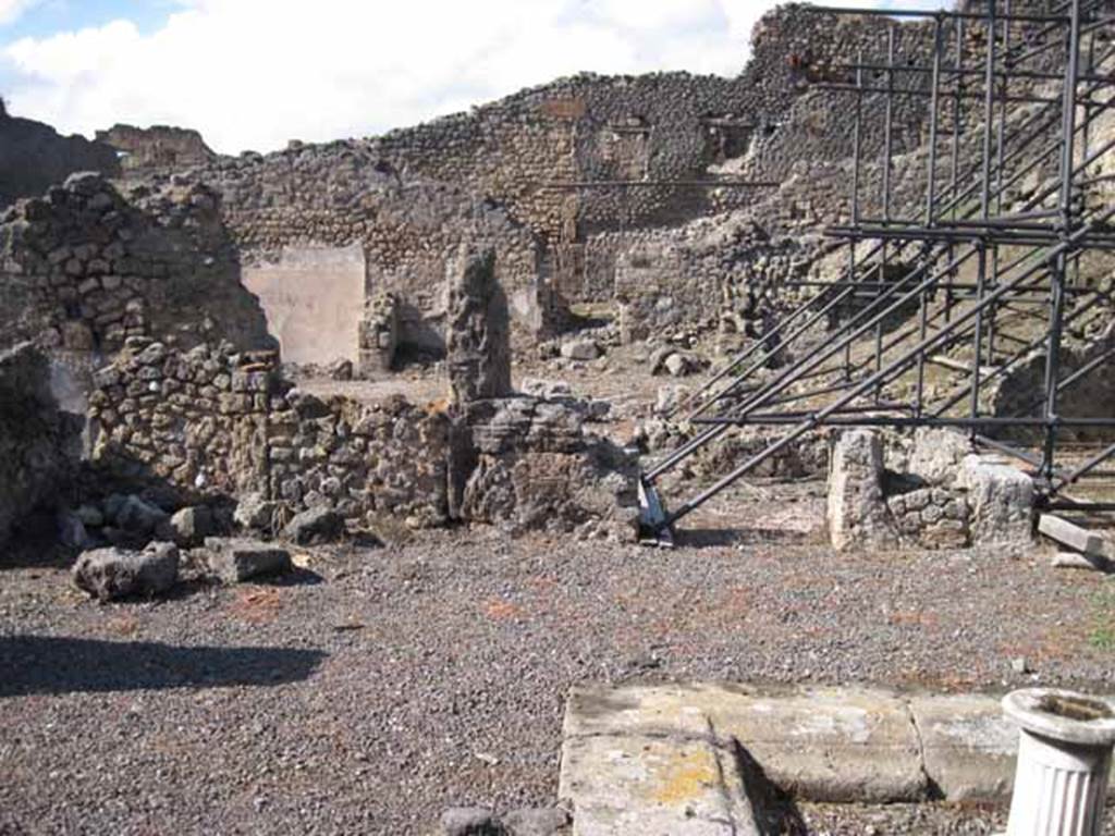 I.2.10 Pompeii. September 2010. Remains of north wall of atrium (north-west side). Looking north towards I.2.11/12/13/14. Photo courtesy of Drew Baker.
