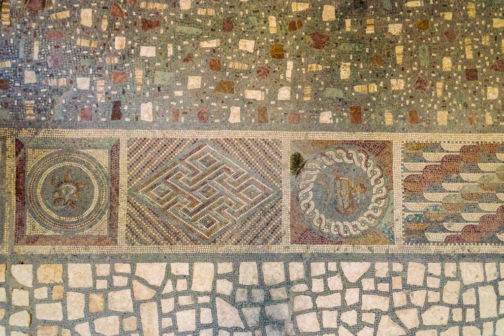 I.6.2 Pompeii. October 2023. Detail of flooring threshold, continued from centre towards south end. Photo courtesy of Johannes Eber.