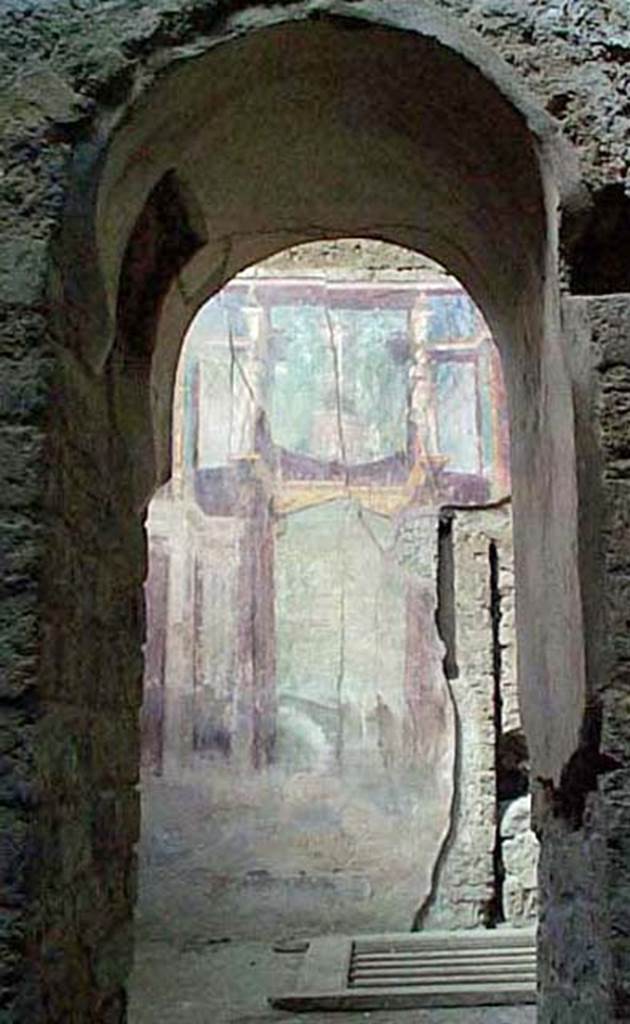 I.6.2 Pompeii. December 2007. 
Looking north through arched doorway to frigidarium.
