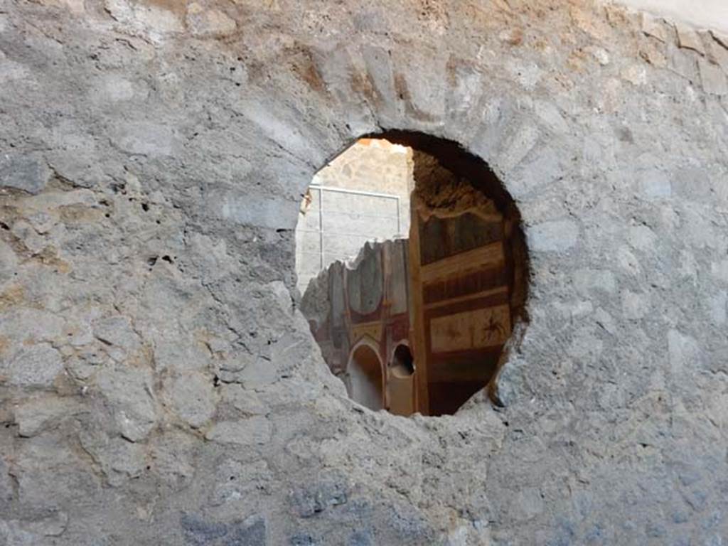 I.6.2 Pompeii. May 2016. Looking through circular window into frigidarium, from east wing of cryptoporticus. Photo courtesy of Buzz Ferebee.