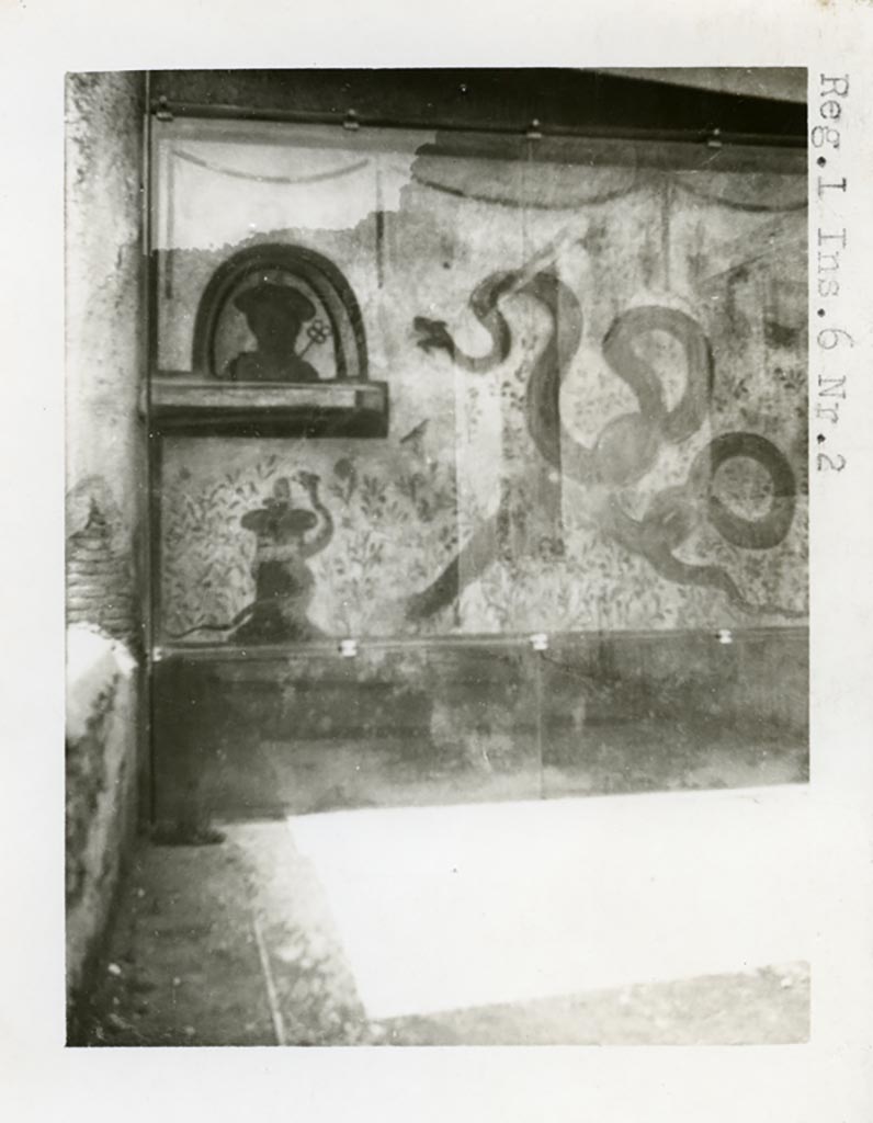 I.6.2 Pompeii. Pre-1937-39. Painted lararium on west wall near portico.
Photo courtesy of American Academy in Rome, Photographic Archive. Warsher collection no. 1569.