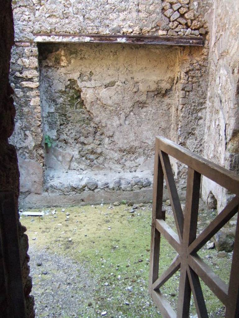 I.6.2 Pompeii. May 2006. Looking east through doorway In north-east corner of cryptoporticus.  