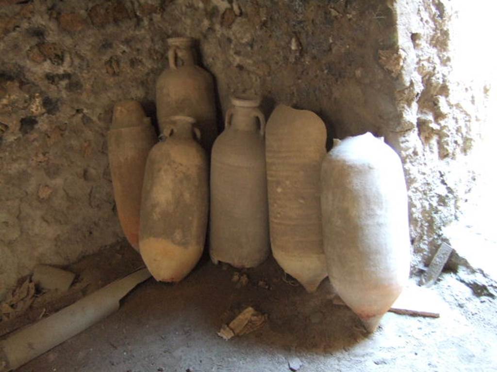 I.6.2 Pompeii. May 2006. Amphorae in cryptoporticus near doorway in north-east corner.   