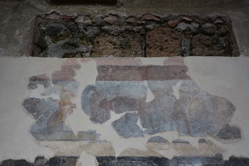 I.6.2 Pompeii. March 2019. Detail from upper centre of painted panel on north wall of north wing.
Foto Annette Haug, ERC Grant 681269 DÉCOR.