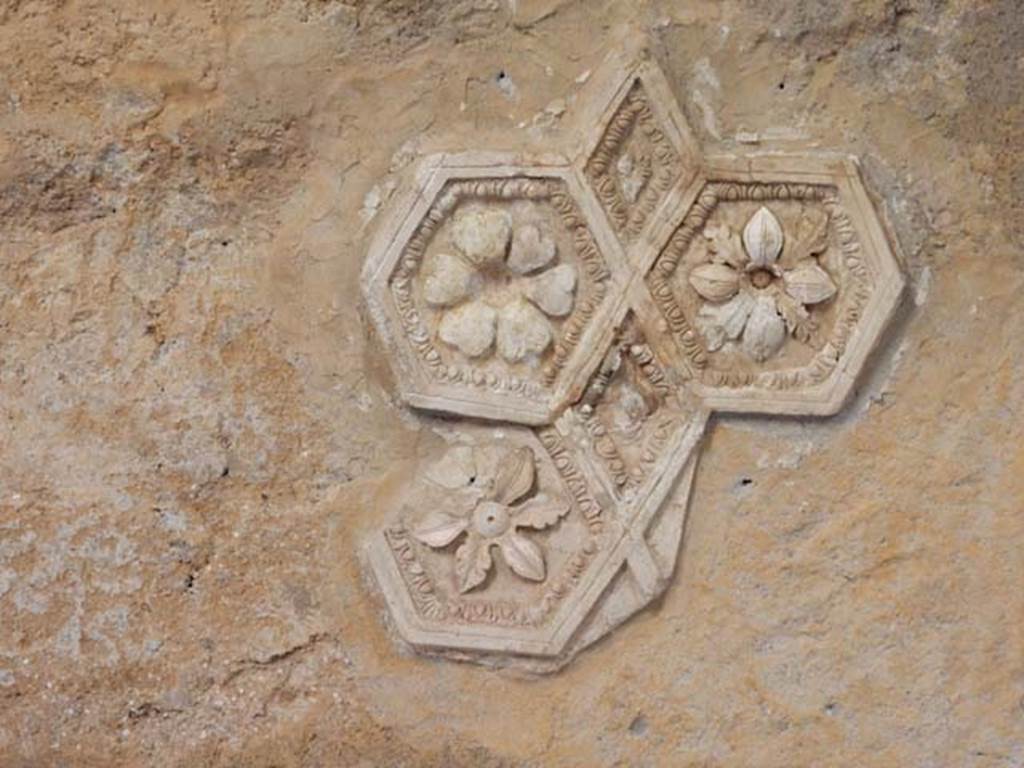 I.6.2 Pompeii. May 2016. Detail on stucco ceiling above north wall of north wing.
Photo courtesy of Buzz Ferebee.