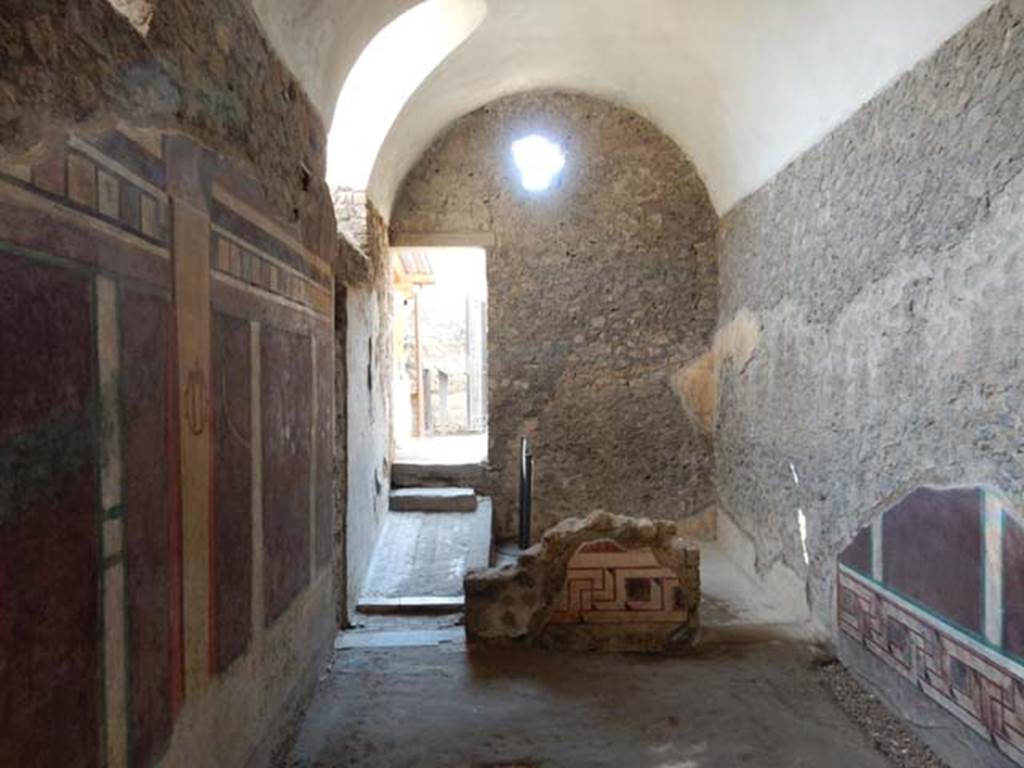 I.6.2 Pompeii. May 2016. Looking south along west wing at south end with doorway to baths’ area at I.6.16.
Photo courtesy of Buzz Ferebee.