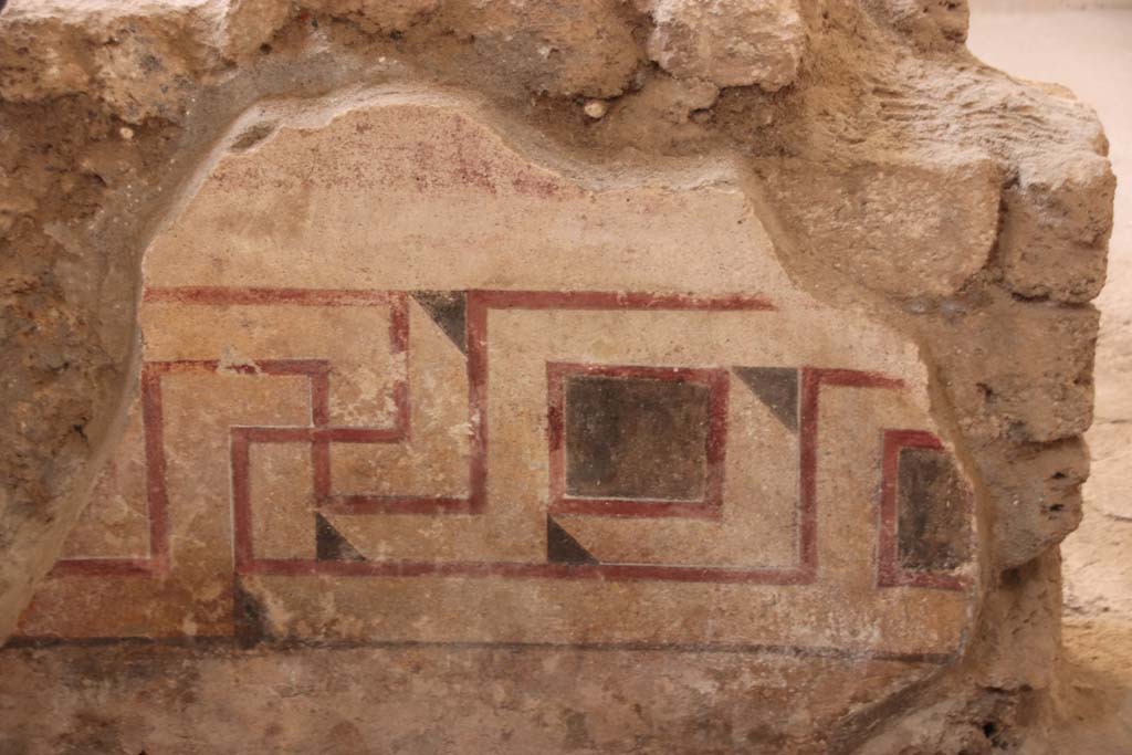 I.6.2 Pompeii. September 2021. Painted decoration at south end of west wing. Photo courtesy of Klaus Heese.