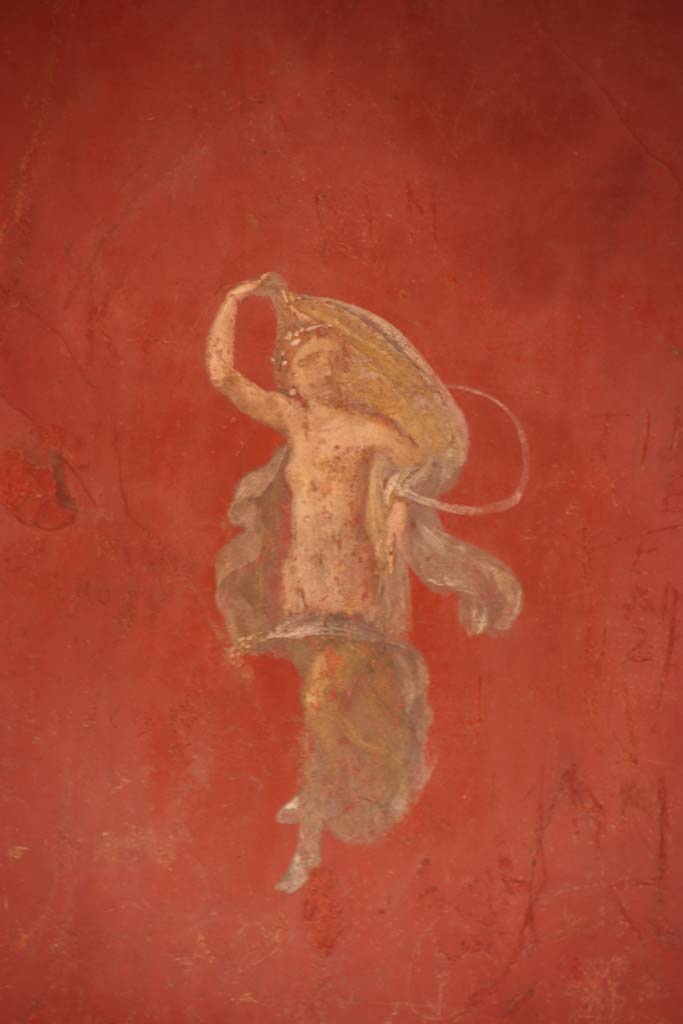 I.6.7 Pompeii. September 2019. Detail of painted flying female figure from central panel of east wall.
Photo courtesy of Klaus Heese.