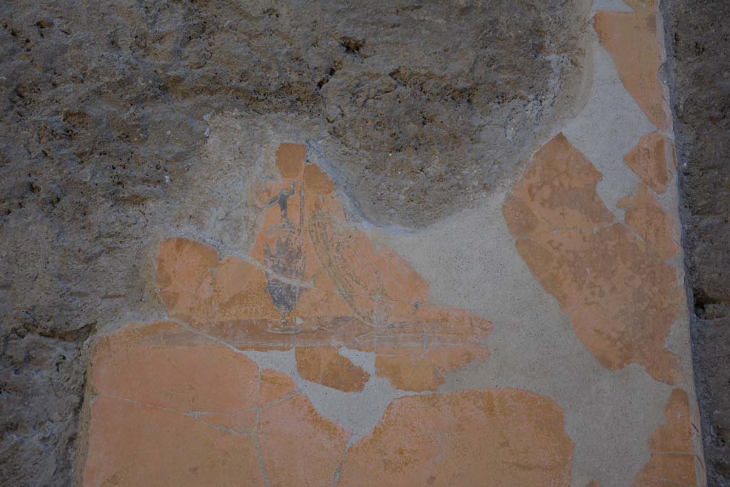 I.7.1 Pompeii. October 2019. Detail of painted vignette of shield and vase on yellow panel, south of centre of east wall of atrium.
Foto Annette Haug, ERC Grant 681269 DÉCOR.