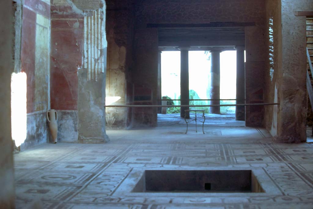 I.7.1 Pompeii. August 1976. Looking south across atrium towards tablinum, oecus and peristyle.
Photo courtesy of Rick Bauer, from Dr George Fay’s slides collection.